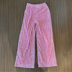 Nwot Pink Sequin Glitter Wide Leg Trousers Fit: Size 6 Fits True To Size Measurements: Waist: 14” Flat Rise: 14” Inseam: 32” Details: High Rise Wide Leg All Over Sequin Side Zip Closure Fabric: Styling: Whether You’re Dancing The Night Away Or Toasting To New Beginnings, These Trousers Are Your Go-To Choice For A Glamorous Evening. Get Ready To Shine! About Rae Hello I’m Rae! Thank You For Shopping My Closet I’m A Wardrobe Stylist, Upcycled Designer, And Secondhand Expert In Los Angeles On A Mis Purple Sequin Pants, Glitter Wide Leg Pants, Fabric Styling, Pink Wide Leg Trousers, Glitter Pants, To New Beginnings, Sequin Pants, Wardrobe Stylist, Pink Pants