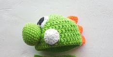 "Add a \"Baby Yoshi\" bodysuit to this Yoshi hat here: https://www.etsy.com/listing/545523190/ This Yoshi beanie is perfect to keep babies head covered and also PERFECT for photo shoot props! This listing is for the hat ONLY full outfit is available! **Hat Sizes** Preemie - 12-13\" Newborn - 13-14\" 0-3 Months - 14-15.5\" 3-6 Months - 15.5-16.5\" 6-9 Months - 16.5-17.5\" 9-12 Months - 17.5-18.5\" 12-18 Months - 18-19.5\" Toddler - 19.5-21.5\" FULL Yoshi Outfit: https://www.etsy.com/listing/54227 Yoshi Outfit, Yoshi Halloween, Crochet Yoshi, Yoshi Costume, Photo Shoot Props, Hat Halloween Costume, First Halloween Costumes, Preemie Hats, Newborn Photo Outfits