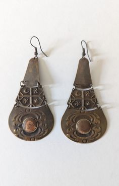 "Vintage Brass Earrings with punched design measures 2.5\" long x 1.5\" wide natural patina unsigned for more listings, please click here: https://www.etsy.com/shop/MonarkVintage Vintage condition usually means \"pre-loved\". We do, however try our best to show in the pictures and name in the description any imperfections beyond what is considered \"mild wear\". Vintage items are sold \"as is\" and we do not accept returns. If you have a question about an item or wish to see more photos, we will Handmade Retro Metal Earrings, Handmade Metal Retro Earrings, Vintage Bronze Earrings For Festival, Vintage Bronze Metal Earrings, Vintage Bronze Earrings With Oxidized Finish, Bronze Vintage Earrings With Oxidized Finish, Vintage Nickel-free Earrings For Festival, Vintage Patina Jewelry For Festivals, Vintage Teardrop Plug Earrings