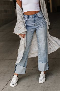 Take your look to new heights with these high waisted wide leg jeans. Crafted with premium light-wash denim, these jeans feature a button & zipper closure, a wide leg fit, and a wide cuffed hem with raw edge detail. Conquer the world in style! High waisted Button & zipper closure Wide leg fit Premium light-wash denim Wide cuffed hem with raw edge detail 68% Cotton/28% Polyester/2% Spandex/2% Viscose Fit and sizing: Features lots of stretchSmall - Waist: 27", Hip: 32", Inseam: 28.5"Medium - Waist Wide Leg Jeans Western, Wide Leg Cuffed Jeans Outfit, Cuffed Jeans Outfit, General Clothes, Wide Cuff Jeans, High Waisted Wide Leg Jeans, Conquer The World, Sneakers Looks, Cuffed Jeans