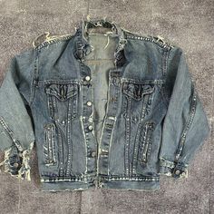 Jacket is in poor condition overall, has lots of rips and holes (pictured above) Fits true to size men's small Vintage Ripped Denim Jacket For Fall, Vintage Ripped Streetwear Outerwear, Vintage Ripped Outerwear For Streetwear, Distressed Grunge Cotton Denim Jacket, Grunge Distressed Cotton Denim Jacket, Grunge Cotton Denim Jacket Distressed, Rugged Distressed Outerwear In Faded Color, Rugged Faded Distressed Outerwear, Rugged Distressed Faded Outerwear