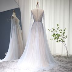 Warm Tips : 1. If the dress 100% real photos ? All the dresses you see are 100% real photos made by our factory ,you will get exactly what you see ,even more beautiful than photos :) 2. How long can I receive the dress ? Usually we can ship the dress within 7-15 days .Shipping time is about 5-7 working days by DHL ,Fedex,UPS,TNT etc.If you need it urgently , please tell us ,we can arrange a rush order for you :) 3. If have the tax? The taxes are charged by your country ( most countries doesn't c Dresses With Cape Sleeves, Evening Dresses Short Parties, Evening Dress With Cape, Dress For Women Wedding, Dress With Cape Sleeves, Dubai Evening, Dress With Cape, Formal Parties, Intricate Beading