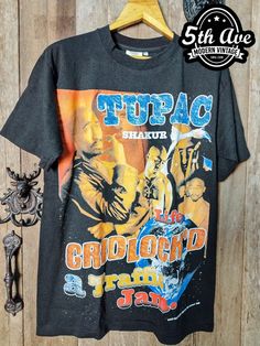 #tupac #2pac #rapper #hiphop #politicalhiphop #westcoasthiphop #tee #tshirt #streetwear #vintagereprint #vintaget #y2k #shopvintage #thrift #thriftshop #90sstyle #vintageclothing #vintaget #bootleg Acid Wash T-shirt With Front Print For Streetwear, Vintage T-shirt With Sublimation Print For Streetwear, Vintage Sublimation Print T-shirt For Streetwear, Tupac Tshirt Design, Retro Tri-blend T-shirt For Streetwear, Tri-blend Retro T-shirt For Streetwear, 2pac Tshirt, Tupac Tee Shirts, Tupac T Shirt