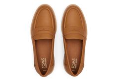 This slip-on shoe offers a modern take on the lug sole loafer trend. Inspired by the comfort of our bestselling boots, the must-have Cara features stylish leather uppers and a silhouette that looks great with jeans, skirts, dresses, and more. Look good, feel good, and do a whole lot of good. WEAR TOMS. WEAR GOOD. | Leather upper. TOMS leather products support responsible manufacturing via the Leather Working Group. Cushioned and durable EVA midsole. Custom CloudBound™ insoles for all-day comfort Business Winter Shoes, Winter Business Shoes Women, Business Professional Shoes For Women, Modern Brown Slip-ons For Fall, Office Work Shoes, Business Casual Slip-ons With Removable Insole For Fall, Modern Fall Slip-ons With Removable Insole, Casual Loafers With Lug Sole And Round Toe, Leather Platform Loafers With Cushioned Footbed For Fall