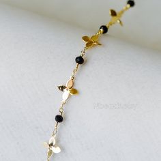 Size: flower width 11mm / black crystal rondelle size 4mm Color: polished shiny gold Material: real gold plated on brass, Chinese crystal beads Quantity: 1 meter=3.3 feet approx. Others: high quality, handmade, color not easily tarnish Tips: you can cut the chain into pieces, use as charm/ connectors ❤ See more quality chains here: ❤ https://www.etsy.com/shop/Nbeads?search_query=LK ❤ See more metal supplies here: ❤ https://www.etsy.com/shop/Nbeads?search_query=GB Gold Beaded Chain Flower Jewelry, Gold Flower Beaded Chain Jewelry, Gold Flower Shaped Beaded Chain Jewelry, Gold Flower-shaped Beaded Chain Jewelry, Rainbow Crystal, Crystal Chain, Black Crystals, Real Gold, Gold Material