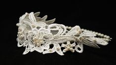 Pretty vintage art deco inspired ivory  bridal Headband. Trimmed with beautiful ivory guipure lace and hand sewn pearls, attached to a wire alice band threaded with pearls.  Origanal design, hand made with tender loving care. Size: 5 cm at the widest part of the lace. Elegant Scalloped Lace For Brides, Elegant Bridal Accessories With Lace Trim For Party, Adjustable Beaded Wedding Headpieces, Adjustable Beaded Headpiece For Wedding, Elegant Bridal Accessories With Delicate Lace For Party, Adjustable Beaded Headband For Wedding, Delicate Lace Wedding Jewelry, Lace Party Headband, Elegant Beaded Lace Bridal Accessories