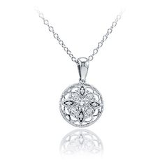 You'll adore wearing this round Sterling Silver and diamond pendant daily. The delicate filigree work describes a starburst motif, with nine sparkling diamonds adorning the points of the star. The G-H color, I2 clarity diamonds total 0.05cttw. An 18 cable chain is included. Fine Jewelry Diamond Necklace With Intricate Design, Gift Diamond Necklace With Intricate Design, Anniversary Medallion Diamond Necklace With Accents, Diamond White Necklace With Intricate Design, Round Rose Cut Diamond Necklace, Classic Diamond Necklace With Filigree Design, Classic Diamond Necklace With Filigree, Classic Diamond Filigree Necklace, Round Diamond Necklace With Intricate Design