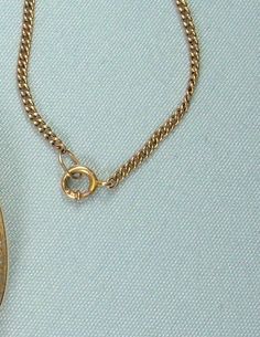 "** We do not clean our items - this could use a cleaning ** Beautiful carving set in solid gold. The pendant can be worn as either a pin/brooch or as a pendant. Just about 1-3/16'' (3.1 cm) tall not including the hinged bail. The shell alone is about 1\" (2.6 cm) tall by 3/4\" (1.9 cm) wide. Marked '10K'. I don't see any other markings/hallmarks. It has a tube safety catch, which was patented c 1850. The chain is just about 16-1/2\" (41.5 cm) long by 1 mm wide. This has a spring ring clasp &amp Vintage 14k Gold Necklaces With Curb Chain, Vintage 14k Gold Curb Chain Necklaces, Vintage 14k Gold Curb Chain Necklace, Vintage Round Curb Chain Necklace, Vintage Curb Chain Jewelry As Gift, Vintage Style Curb Chain Jewelry As A Gift, Vintage Jewelry With Curb Chain For Gifts, Vintage Style Jewelry With Curb Chain For Gift, Vintage 14k Gold Jewelry With Lobster Clasp