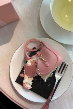 a piece of cake on a plate with a fork