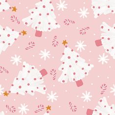 a pink background with white christmas trees and candy canes