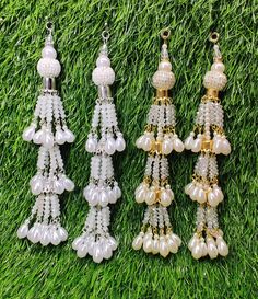 Indian Handmade Latkan Tassels for Saree Blouse Lehenga HandBags Hangings Dupatta Decoration Bridal Wedding dress for Women pair of 2 pcs Size - 17.0 cm Length  Item Description You can use this Beautiful pair of tassle for several DIY projects.  *These beautiful Tassel Latkans are used as the accessory for saree blouse on the back, but u can use according to your need and your innovative ideas. * Package contains 2 Latkan / 1 Pair Other Than Saree Blouse, you can use these latkans in various ways Craft Projects Designing Home Decoration Festive celebrations. Evening and party Apparels. Home décor items Apparel & Fashion Scarves n Stoles Headband, hats Table cover, curtains, Pillow covers, Cushion cover Shoe designing Headband, hats Table cover, curtains Designing stylish blouses Ship From Tassels For Saree, Latkan Tassels, Saree Bluse, Wedding Dress For Women, Sari Lehenga, Blouse Lehenga, Bridal Wedding Dress, Gold Caps, Innovative Ideas