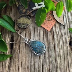 "A stunning Shattuckite stone with shades of azure to a dark, deep blue is the focal point for this pendant. The colors are amazing, and the pattern almost seems like branches and roots of a tree!  I've set this beautiful stone within a beaded wire border, and the back is patterned with an paisley pattern for a lovely, unique showpiece. Shattuckite is believed to be a stone of intuition, mediumship, and psychic abilities, offering clarity of the mind, heart, and throat, and creating a connection Roots Of A Tree, Evening Necklace, Mind Heart, Antler Necklace, Eye Gift, Silver Choker Necklace, Jasper Earrings, Silver Choker, Eye Beads