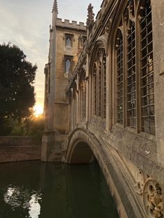 an old bridge over a body of water