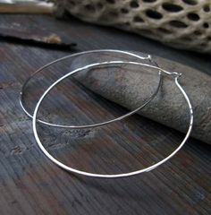 Big sterling silver simple hoop earrings. Artisan handcrafted 16 gauge 2 1/2" wire work. Modern larg Silver Hypoallergenic Open Circle Hoop Earrings, Adjustable Sterling Silver Hoop Earrings With Ear Wire, Silver Hypoallergenic Hoop Earrings, Hypoallergenic Silver Open Circle Hoop Earrings, Hypoallergenic Sterling Silver Hoop Earrings, Adjustable Cadmium-free Sterling Silver Hoop Earrings, Simple Adjustable Sterling Silver Hoop Earrings, Simple Sterling Silver Hoop Jewelry, Dainty Sterling Silver Hoop Earrings