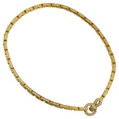 Brand: Cartier Collection: Agrafe Style: Pendant Necklace Metal: Yellow Gold Metal Purity :18K Stones: Round Brilliant Cut Necklace Length: 15.5 inches Pendant Size: 1 inch Total Item Weight(Grams): 55.8 Hallmark: Cartier; 18k; Serial # Includes: 24 Month Brilliance Jewels Warranty Brilliance Jewels Packaging Luxury Cartier Fine Jewelry Necklaces, Classic Cartier Luxury Necklace, Luxury Gold Diamond Necklace By Cartier, Classic Yellow Gold Luxury Necklace, Pave Necklace, Golden Necklace, Round Necklace, Agra, Metal Necklaces