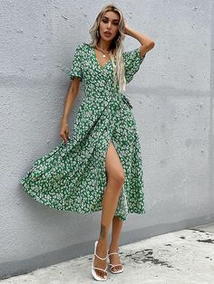 Description Pattern Type textile printing Season summer Type Simplicity Neckline V-neck Waist Line easy Length long Fit Type Slim Fit Fabric Low Stretch Material Polyester Size & Fit Size Guide (unit: cm) Size Bust Length Sleeve Shoulder Waist S 87 123 23 38 74 M 91 125 23.5 39 78 L 97 127 24 40.5 84 XL 103 129 24.5 42 90 Note: The size may have 1-3cm differs to manual measurement please note when you mearsure. Free Return & Exchange FREE RETURNS on all US orders! The following conditions must b Printed Green Dress, Summer Wrap Dress, Wrap Dress Styles, Mode Tips, Outfits Classy, Dresses Trendy, Midi Wrap Dress, Elegant Dresses For Women, Weave Style