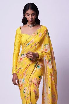 Golden yellow georgette saree with floral pattern and thread and mirror hand embroidered borders. Comes with a padded raw silk blouse. - Aza Fashions Yellow Georgette Pre-draped Saree With Pallu, Yellow Dupatta With Floral Embroidery For Reception, Elegant Yellow Blouse With Dupatta, Fitted Yellow Pre-draped Saree With Pallu, Designer Yellow Blouse With Mirror Work, Yellow Semi-stitched Silk Blouse Piece, Navratri Yellow Silk Blouse Piece, Semi-stitched Silk Yellow Blouse Piece, Yellow Silk Blouse Piece For Navratri