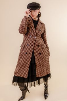 You didn't expect us to design just dresses, right? Meet our first official Ivy City Coat! The Tabitha Coat was designed to take your breath away with a beautiful houndstooth print, double breasted buttons, long sleeves, and a length that is to die for! SIZING TIP: These coats are running snug. We recommend sizing up 1-2 sizes to wear with sweaters. For a better fit, measure yourself and compare your measurements to the size chart. *Please note: For sizes XL to 5X, there is added length making t Brown Double-breasted Outerwear For Office, Double-breasted Wool Houndstooth Outerwear, Winter Houndstooth Double-breasted Blazer, Wool Double-breasted Houndstooth Outerwear, Elegant Double-breasted Houndstooth Outerwear, Fitted Double-breasted Houndstooth Outerwear, Tailored Double-breasted Houndstooth Outerwear, Elegant Houndstooth Outerwear For Fall, Plaid Wool Coat For Fall Workwear