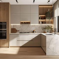 a modern kitchen with marble counter tops and wooden cabinetry, along with an oven