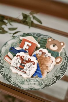 some cookies are sitting on a glass plate