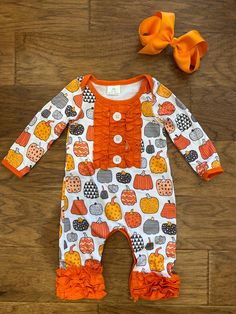 This adorable pumpkin print romper is perfect for Fall weather and the upcoming holidays.  The bold contrast is perfect for making a statement and standing out in any event or occasion.  This romper features snap closures for easy access to diaper changes! *Bow not included! *Wash on cold, delicate cycle. Playful Cotton Onesie For Fall, Playful Fall Cotton Onesie, Fall Long Sleeve Bubble Romper For Playtime, Fall Orange, Romper Bodysuit, Baby In Pumpkin, Pumpkin Print, Printed Rompers, Pumpkin Orange