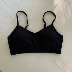 Athleta Black Sports Black. Adjustable Straps. Removable Padding. Size Medium. Brand New/Never Worn. Love This Bra So Much I Realized I Already Had This Bra. Inside Rip Tag Still Attached. Casual Micro-elastic Sports Bra With Built-in Bra, Comfortable Stretch Sports Bra For Workout, Comfortable Seamless Activewear For Training, Seamless Comfortable Activewear For Training, Seamless Medium Support Activewear, Black Sports Bra With Built-in Bra And Medium Support, Comfortable Sports Bra With Medium Support, Comfortable Medium Support Sports Bra, Comfortable Medium Support Sports Bra For Sports