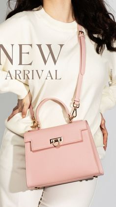 The stunning new Layla satchel in Pink is the perfect addition to your Spring outfits. Available in 8 colours. A fab work bag for women, birthday gift idea for her or a treat just for you. Big enough to carry all your handbag essentials. Wear crossbody, over shoulder or carry along. Bring the Spring aesthetic and pair with white jeans for the ultimate look! Grab yours now! Elegant Shoulder Flap Bag For On-the-go, Elegant Flap Bag With Detachable Strap For On-the-go, Elegant Handheld Bucket Bag For On-the-go, Spring On-the-go Bag With Adjustable Strap, Chic On-the-go Shoulder Box Bag, Chic Flap Bag With Removable Pouch For Daily Use, Spring Leather Bags With Detachable Handle, Chic On-the-go Crossbody Bag, Spring Leather Satchel With Double Handle