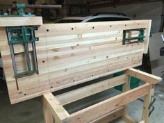 a bench made out of wood in a garage