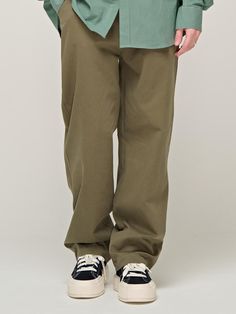 This is a casual and comfortable banding pants that are made out of high quality cotton 100% fabric. With design detail of semi oversized silhouette, elastic waistband with string, and minimal detail it gives a comfortable and trendy mood.- Relaxed semi oversized silhouette- Side pockets and back patch pockets- Elastic waistband with string Casual Beige Parachute Pants For Loungewear, Relaxed Solid Cotton Pants, Relaxed Solid Color Cotton Pants, Relaxed Cotton Pants In Solid Color, Khaki Relaxed Fit Cargo Trousers, Casual Solid Cargo Pants For Loungewear, Casual Loungewear Cargo Pants, Spring Khaki Cotton Pants, Everyday Relaxed Cotton Pants