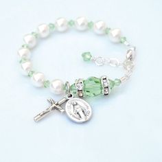 Pulsera de rosario de regalo de bautismo para niña Piedra natal de agosto verde peridoto Personalizada Perlas blancas de cristal Bautizo católico - Etsy Adjustable Rosary Bracelet With Miraculous Medal For First Communion, Silver Beaded Jewelry For Baptism, Silver Baptism Jewelry With 8mm Beads, Adjustable Rosary Bracelet For First Communion, Adjustable Rosary Bracelet With Round Beads For First Communion, Adjustable Rosary Bracelet With Round Beads For Baptism, Silver Jewelry With 8mm Beads For Baptism, Adjustable Round Beads Jewelry For First Communion, Adjustable 8mm Beads Rosary Bracelet For Baptism