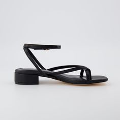 Meet Novella, the perfect heeled sandal for any occasion! With a soft vegan leather upper, Novella features an adjustable ankle strap, memory foam padding and a flexible, long lasting traction outsole for all-day comfort. Plus, the classic 1 inch block heel gives you a stylish, sophisticated blend, that can be suited towards any look. Bridesmaid Flat Shoes, Low Heels Sandals, Black Low Heel Sandals, 1 Inch Heels Sandals, Low Block Heels Outfits, Cute Low Heels, Sandals For Graduation, Flat Formal Shoes, Dress With Flat Sandals