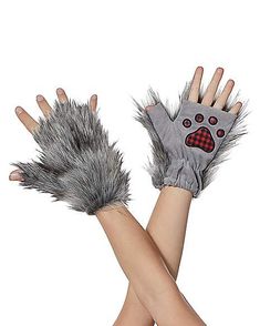 two hands wearing gloves with grey fur on the palm and one has a cat's paw