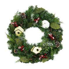 a christmas wreath with birdhouses and pine cones