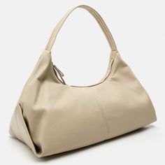 Large Soft Shoulder Bag. Shoulder Strap. Zip Closure. Height X Length X Width: 13 X 18.9 X 7.5 Inches (33 X 48 X 19 Cm) Ecru | 6096/110 Zara Bag For Everyday Use, Zara Satchel With Removable Pouch For Everyday, Zara Leather Shoulder Bag For Everyday Use, Zara Leather Shoulder Bag, Classic Zara Shoulder Bag For Everyday, Modern Zara Bags For Daily Use, Zara Classic Everyday Shoulder Bag, Modern Zara Bags, Zara Satchel Shoulder Bag For Everyday