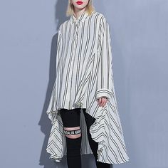 Pattern Type: Blouse Sleeve Type: Long SleeveWaistlines: NaturalElasticity: Slight-stretchyThickness: LightweightMaterial: 51%-70% Cotton-BlendNeckline: Shirt CollarOccasion: Daily, Date timeProcess: Gathered, Asymmetrical, High LowStyle:CasualTheme: SummerLength Front 69 cm / 27.16 "Length Back 108 cm / 42.52 "Sleeve length 57 cm / 22.44 "Cuff: 32 cm / 12.60 "Bust:114 cm/ 44.88 ''Waist: 160 cm/ 62.99 ''Shoulder: 42 cm/ 16.54 '' Trendy Asymmetrical Stretch Blouse, Fitted Asymmetrical Blouse For Daywear, Spring Stretch Blouse With Asymmetrical Hem, Fitted Casual Asymmetrical Shirt, Spring Blouse With Asymmetrical Hem And Stretch, Asymmetrical Hem Blouse For Spring Daywear, Spring Daywear Blouse With Asymmetrical Hem, Asymmetrical Hem Blouse For Daywear In Spring, Spring Blouse With Asymmetrical Hem For Daywear