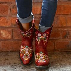 About: The Cowgirl Embroidery Boots are beautifully detailed with colorful floral embroidery etched in pink, purple, teal, orange, yellow and green thread. The 8 inch shaft is the perfect height for sundresses, but the Cowgirl Embroidery Boots will also look amazing with blue jeans. Handcrafters seriously brought these little cowgirl boots to life. If you are looking to make a bold statement, step into the cowgirl boots and you’ll be turning heads for sure. Specs: Fits true to size, take your no Mode Country, Embroidery Boots, Red Cowboy Boots, Bota Country, Low Heel Boots, Fashionable Shoes, Red Boots, Beautiful Boots, Winter Boots Women