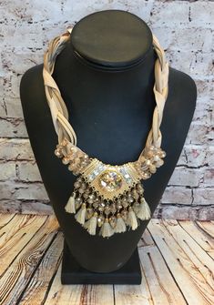 Born To Stun Statement Necklace from privityboutique Bohemian Long Tassel Necklace For Party, Bohemian Gold Tassel Necklace For Party, Adjustable Fringe Dangle Necklace, Adjustable Tassel Necklace For Festivals, Gold Tassel Necklace With Fringe For Gift, Bohemian Multi-strand Beige Jewelry, Bohemian Fringe Tassel Necklace For Parties, Beige Bohemian Multi-strand Jewelry, Bohemian Beige Multi-strand Jewelry