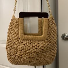 Very Cute Well Made Straw Shoulder Bag! Nwt. Has Wooden Handles And Nicely Lined Inside. One Compartment Beige Straw Bag With Chain Strap For Everyday Use, Brown Vacation Bag With Chain Strap, Brown Bags With Chain Strap For Vacation, Brown Bag With Chain Strap For Summer, Natural Shoulder Bag With Chain Strap For Everyday Use, Summer Rectangular Straw Bag With Gold-tone Hardware, Brown Shoulder Bag With Chain Strap For Vacation, Beige Rectangular Straw Bag With Gold-tone Hardware, Gold Rectangular Straw Bag For Everyday