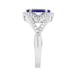 Fall In Love With This Stylish Piece Of Jewelry. A Fashionable Ring Designed Uniquely With 14k White Gold And Set With Round Cut Diamonds And Oval-cut Tanzanite, It Is An Expression Of Luxury. Product Information SKU ADG50924VS/1 Metal Type 14K Metal Color White Gold Ring Style - Primary Stone Gemstone Name Tanzanite Gemstone Species Zoisite No. Of Gemstones 1 Gemstone Shape Oval Gemstone Weight 2.15 Secondary Stone Gemstone Name Diamond Gemstone Species - No. Of Gemstones - Gemstone Shape Round Gia Certified Trillion Cut Diamond Ring For Formal Occasions, Gia Certified Trillion Cut Diamond Ring For Formal Events, Gia Certified Trillion Cut Formal Rings, Formal Gia Certified Trillion Cut Ring, Formal Ring With Trillion Cut And Accent Stones, Formal Rings With Accent Stones In Trillion Cut, Elegant Gia Certified Trillion Cut Ring, Formal Trillion Cut Ring With Accent Stones, Formal Rings With Trillion Cut Center Stone