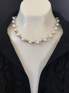 NEW Summer pearl and colorful bead necklace! This handmade 16 inch delicate pearl and gemstone necklace is dainty, super cute with gold filled lobster lock and 2 inch adjustment chain. Perfect for summer! You can use it to layer with your other pearl and gold chain necklaces as well, see images for ideas. The pearls are genuine cultured freshwater pearls, size 8mm to 9mm, white, good quality and the various assorted colorful beads. The length is 16 inches with the adjustment chain, 18 inches. Th Colorful Pearl Beaded Choker Necklace, Pearl Choker With Colorful Round Beads, Colorful Beads Pearl Choker Necklace, Colorful Beaded Pearl Choker Necklace, White Beaded Necklaces With Large Beads For Summer, Colorful Beaded Pearl Choker, Summer Pearl Beaded Single Strand Necklace, Summer Single Strand Pearl Beaded Necklaces, Summer Pearl Single Strand Beaded Necklace