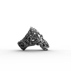 Maori Skull Ring in Sterling Silver (925) - Production time from 2 to 3 weeks The Maori skull ring by Feel No Pain is a jewel for men and women made of 925 sterling silver and engraved with New Zealand culture decorations. The entire surface of the skull ring is covered with symbols inspired by the Maori, including the famous tattoos that have become a sign of recognition throughout the world. Feel No Pain has revisited its design, giving it an antique and old school touch. The silver ring was m Silver Skull-shaped Engraved Rings, Silver Engraved Open Skull Ring, Engraved Silver Skull Open Ring, Elegant Sterling Silver Skull Ring, Engraved White Gold Skull Ring In Sterling Silver, Carved Sterling Silver Skull Ring, Symbolic Sterling Silver Open Skull Ring, Carved Sterling Silver Skull Ring For Gift, Sterling Silver Open Skull Ring, Symbolic Style