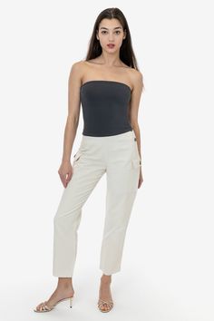 The Adjustable Waist Field Slack was designed to be comfortable and utilitarian, yet flattering and feminine. With 3 adjustable waist buttons at the hip, this is a pant that you can alter depending on how you prefer to style it. Wear it high and tight on the smallest waist button or adjust if you want to tuck a thick sweater in- or if you've had one too many burritos! Darts on the front and back accentuate the curves of your body and gives this piece a tailored fit. We've added one large pocket Smallest Waist, Thick Sweater, Slack Pants, Thick Sweaters, Duck Canvas, Burritos, Small Waist, Cotton Style, Tube Top