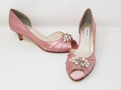 "Dusty Rose Wedding Shoes with a sparkling rose gold applique design. Perfect shoes for the bride. The comfortable 2 inch shoes in the listing (also available in 3 inch heels) have been dyed Dusty Rose, but is also available in over 100 different colors as well as the option of sending us a sample to color match for you! If you chose a different color from my chart or a designer color, please leave the name of the color you would like in the personalization box. If you would like a different hee Wedding Shoes Rose, Heels Rose Gold, Shoes For The Bride, Pink Bridal Shoes, Dream Wedding Shoes, Custom Wedding Shoes, Rose Gold Shoes, Pink Wedding Shoes, How To Dye Shoes