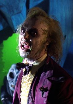 a man dressed up as the joker in a scene from the movie it's dark