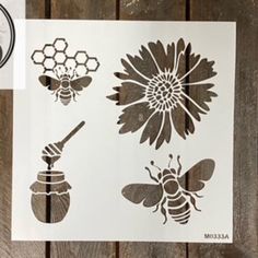 the stencils are being used to decorate flowers and bees