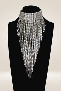 Say goodbye to dull, boring necklaces! Your days are finally over with this statement necklace made of sparkling rhinestone crystals. It's a lightweight accessory that sparkles like crazy and will make you shine like the true diva you are. Long Tassel Coller Necklace made from environmentally friendly material , nickel-free, lead-free, and hypoallergenic. It's safe for sensitive skin This is the ultimate statement quartz crystal necklace for making a big impression. And it's not just about the b