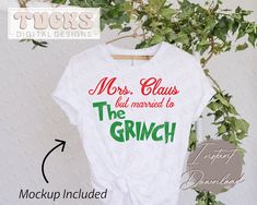 a t - shirt with the words mrs claus but married to the grin on it