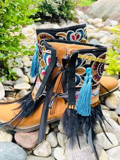 Feather Boot Wrap Ankle / Cover boots Ethnic / Boot Cuffs Boot Accessories Fashion Boot Bling. Sweet Reminder: You will receive a pair of the boot wraps. Boots are not included in your purchase.  Dress up your plain boots with these lovely Bohemian boot accessories. They are guaranteed to give your boots an instant stylish look.  Measurement: 12 inch long (ties not included).  7.5 inch wide.  They will fit all boot sizes. Please do not hesitate to contact me should you have any questions about this or any other item in my shop. Thanks for stopping by. Bohemian Fringe Boots With Round Toe, Bohemian Style Fringe Boots With Round Toe, Festival Boots With Tassels And Round Toe, Western Boots With Tassels For Festival, Western Festival Boots With Tassels, Brown Tasseled Boots For Festivals, Bohemian Boots With Tassels And Round Toe, Bohemian Brown Boots With Tassels, Brown Bohemian Boots With Tassels