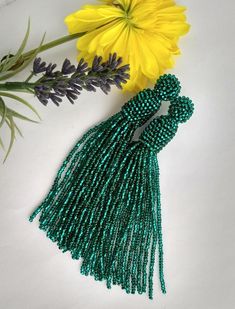 Emerald tassel earrings Long gorgeous green beaded earrings | Etsy Traditional Green Beaded Earrings For Party, Traditional Green Beaded Party Earrings, Beaded Bohemian Chandelier Earrings For Party, Bohemian Beaded Chandelier Earrings For Party, Bohemian Dangle Tassel Earrings For Party, Bohemian Green Chandelier Earrings For Party, Handmade Green Tassel Earrings For Festival, Green Beaded Tassel Earrings For Festivals, Green Beaded Fringe Earrings For Festival