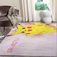 a rug with a cartoon pikachu on it in a living room next to a chair